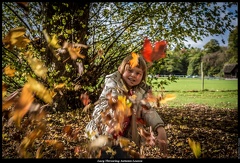 Lucy Throwing Autumn Leaves