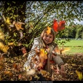 Lucy Throwing Autumn Leaves
